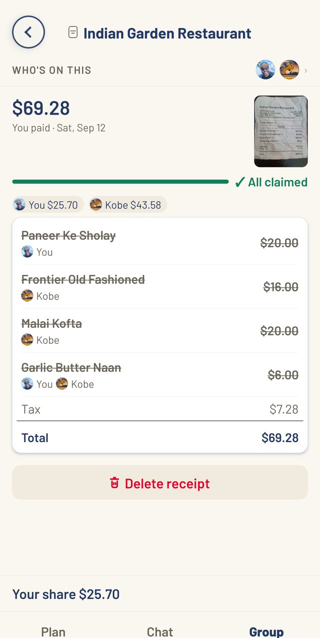 A scanned restaurant receipt for 69 dollars 28 split between two people: each line shows who had it, with the totals and each person's share.